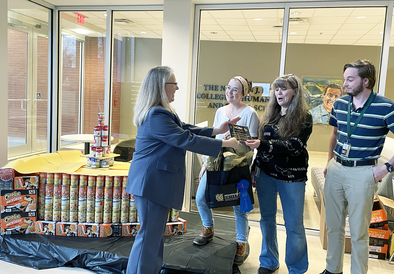 Dean Kaukinen with the winning team "Builders who CARE for a Community who CAN"