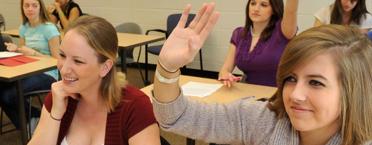 Student raising her hand