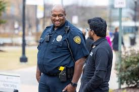 Police officer talking with another person