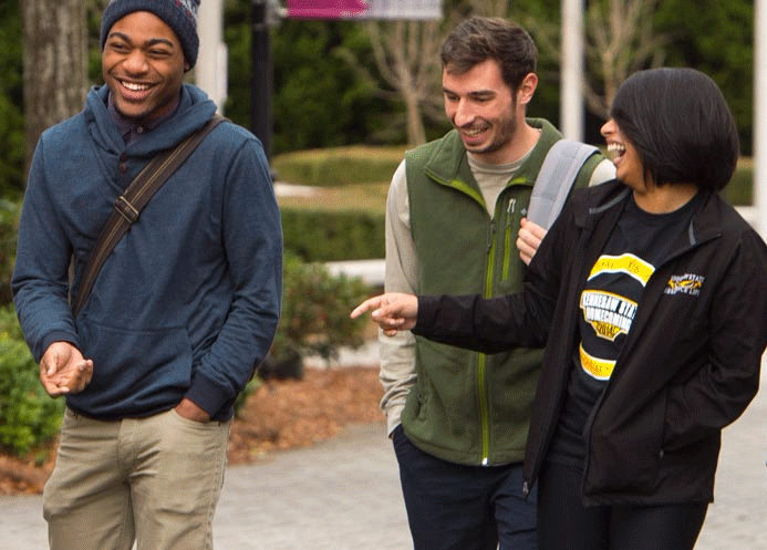 Friends walking on campus