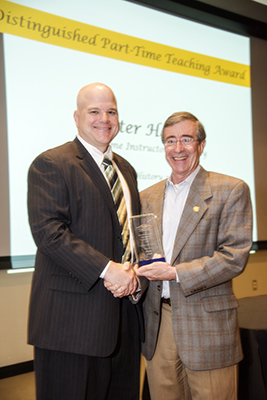  Hunter Smith receives Distinguished part-time faculty award from Dean Robin Dorff.