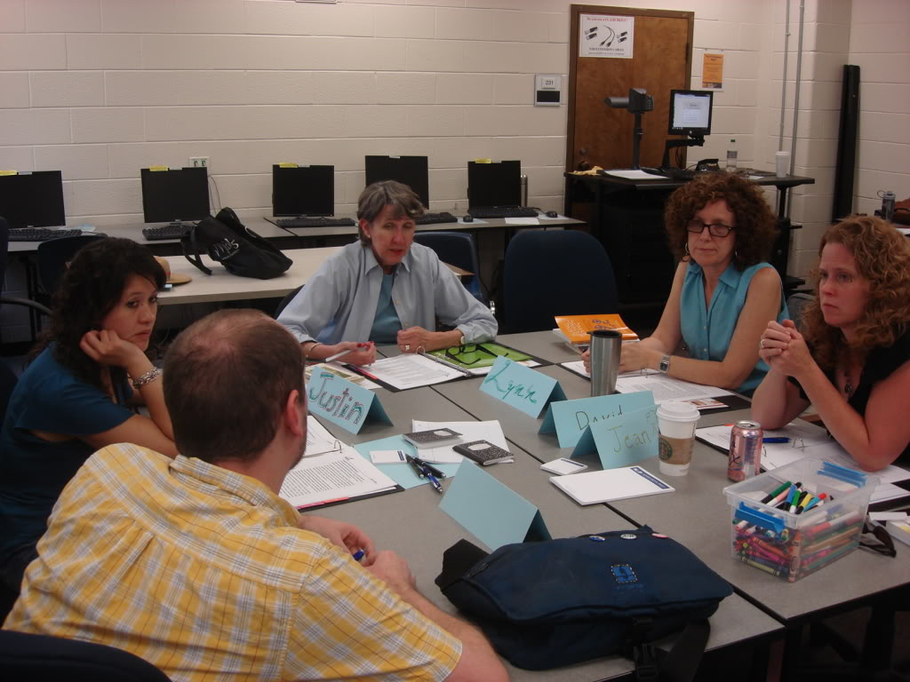 teachers talking at a table