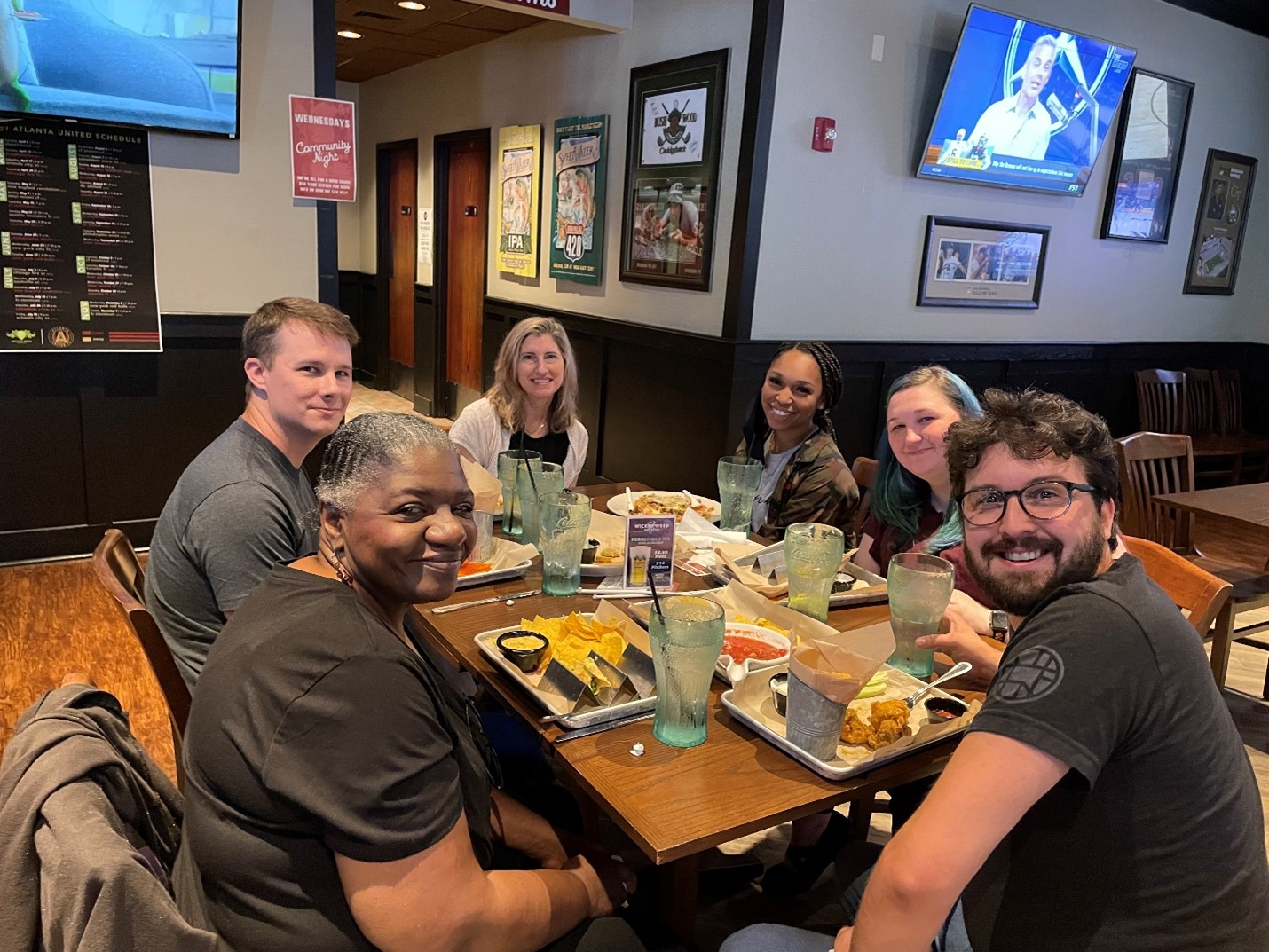 The class enjoying a meal together