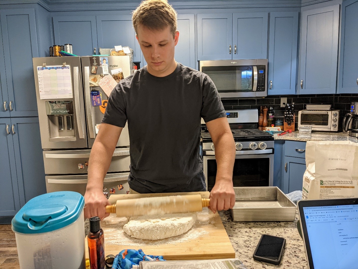 Eric Celler rolling out dough.