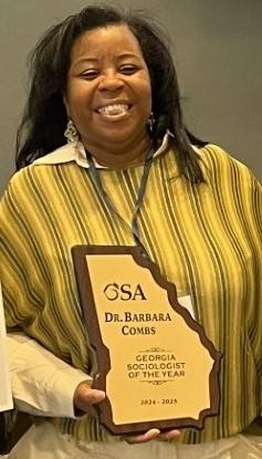  Dr. Barabara Combs Sociologist of the Year with plaque