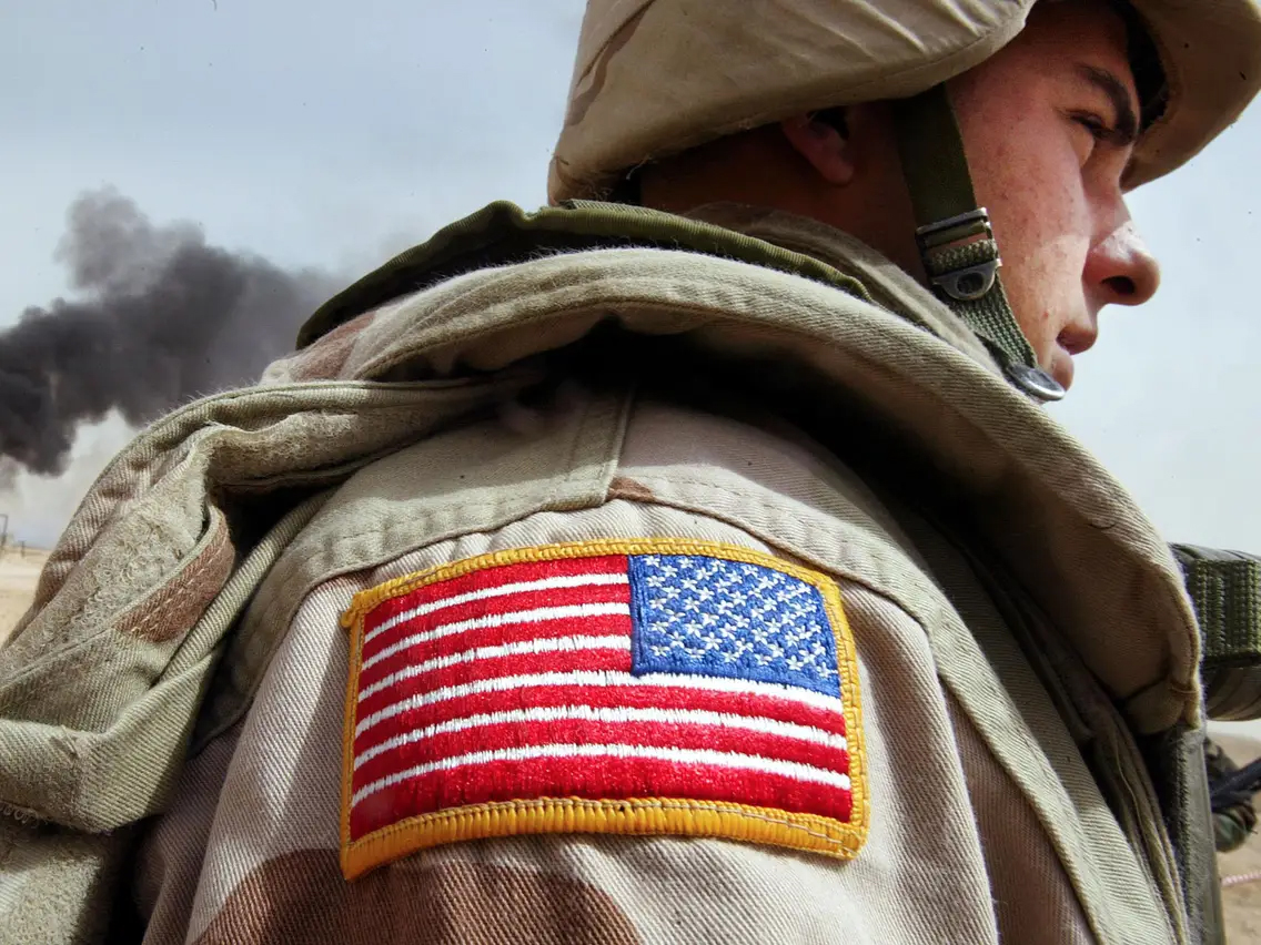 Soldier with flag patch.
