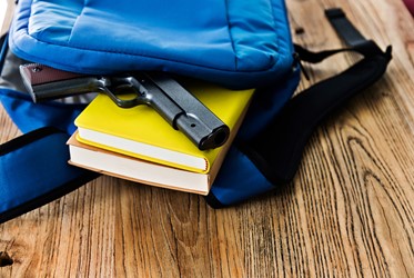 Book bag with a gun in it